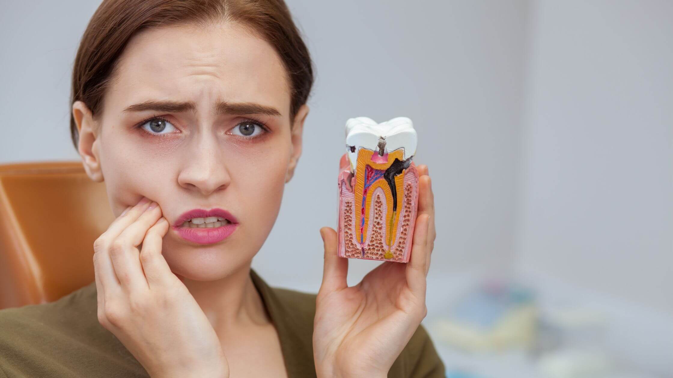 Toothache Troubles: A Guide to Dealing with Front Tooth Cavities | TopsRank